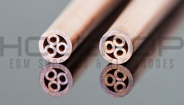 A pair of copper multi-channel electrode tubes.
