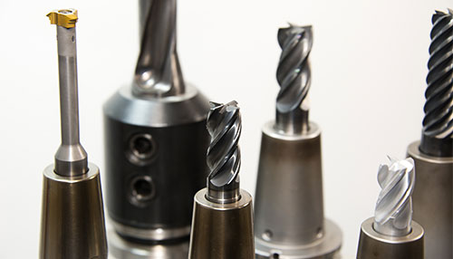 An assortment of drill bits used for CNC drilling.
