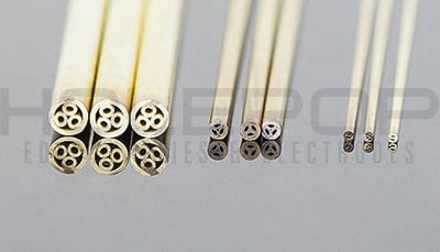 A line of multichannel brass electrode tubes.